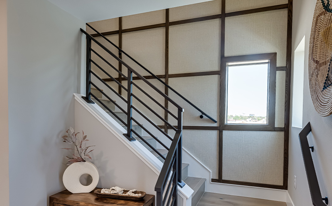 Black Steel Railings with White Kick Boards and Stained Accent Wall