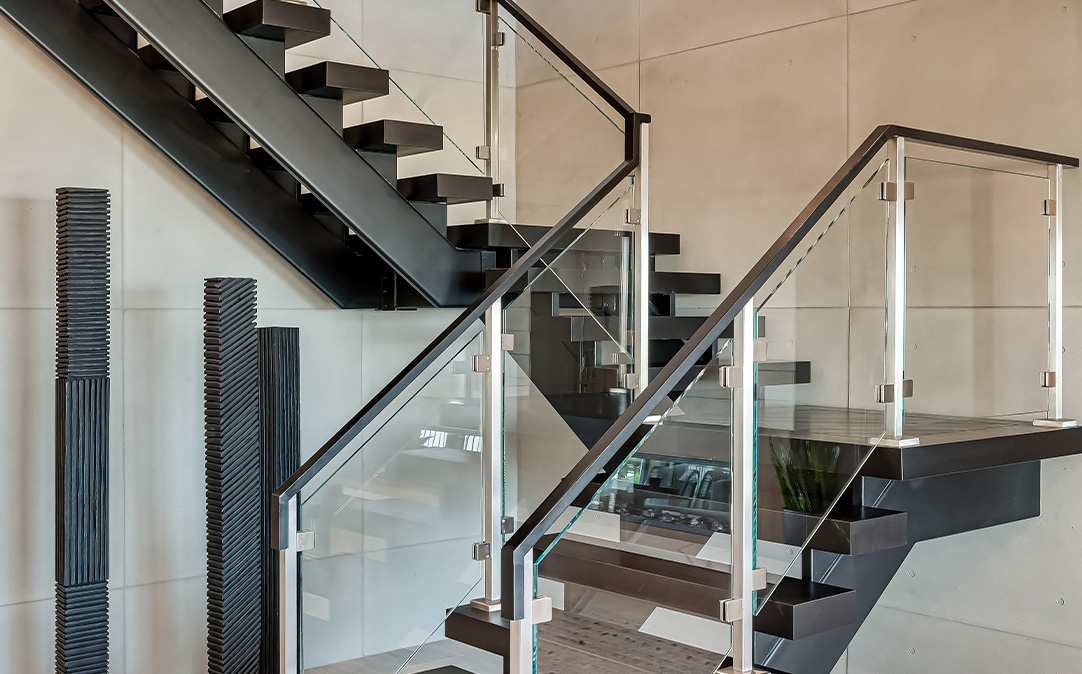 Steel Floating Stair with SS Posts and Glass Panels